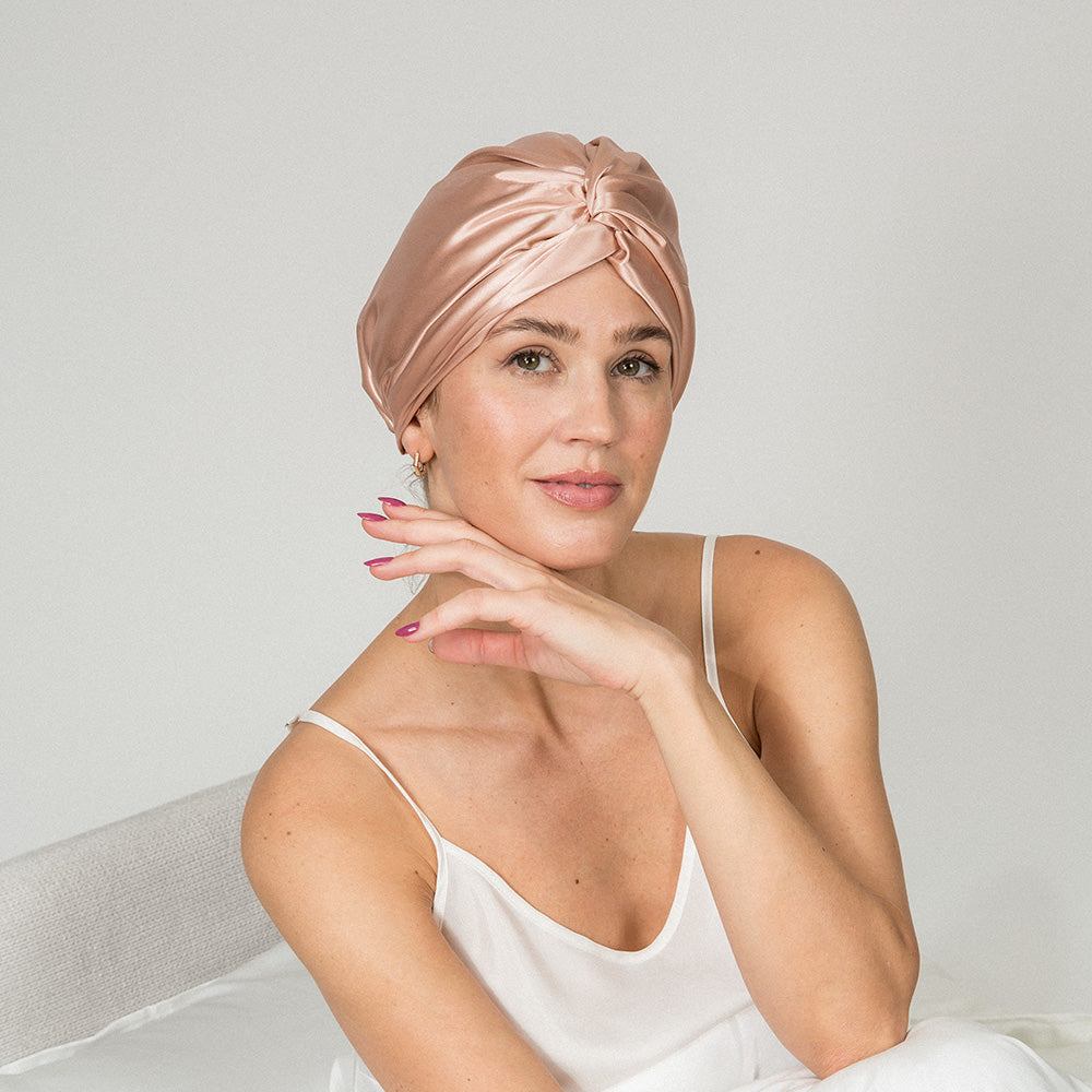 woman wearing a pink color bonnet