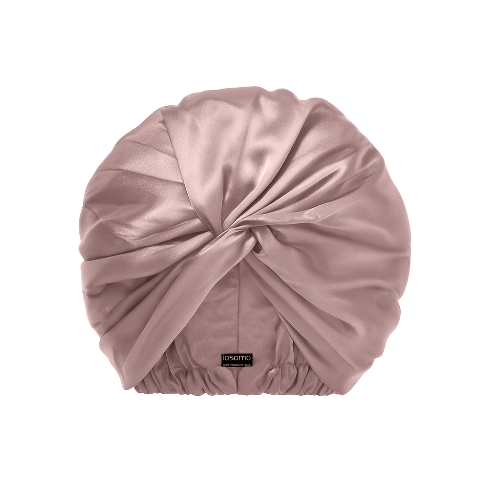 Pink bonnet on a white background