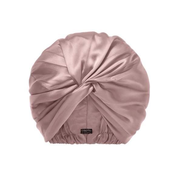 Pink bonnet on a white background