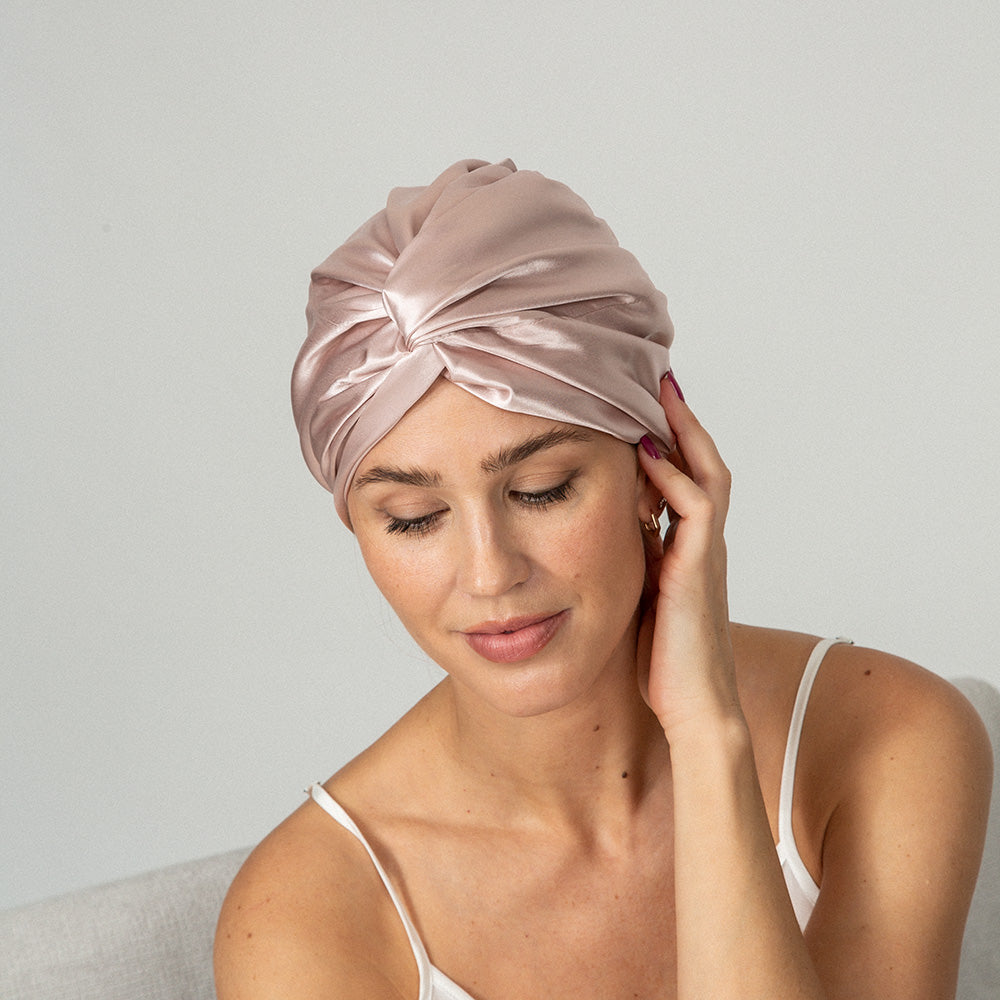 woman wearing a pink color bonnet