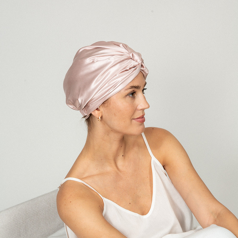woman wearing a pink color bonnet