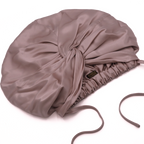 Pink bonnet on a white background