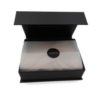 Black open box with a visible brand logo on a white background