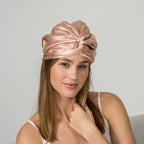 woman wearing a rose pink color bonnet