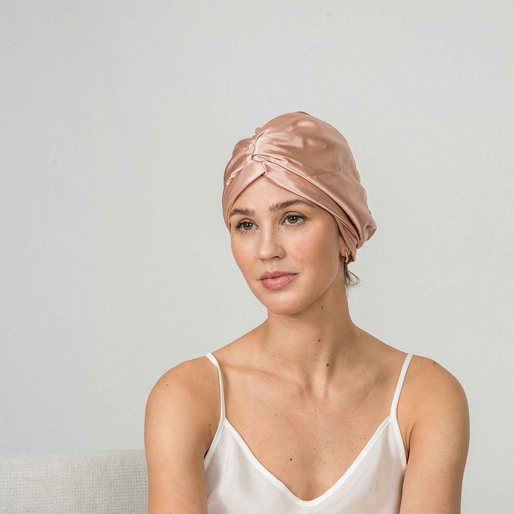 woman wearing a rose pink color bonnet