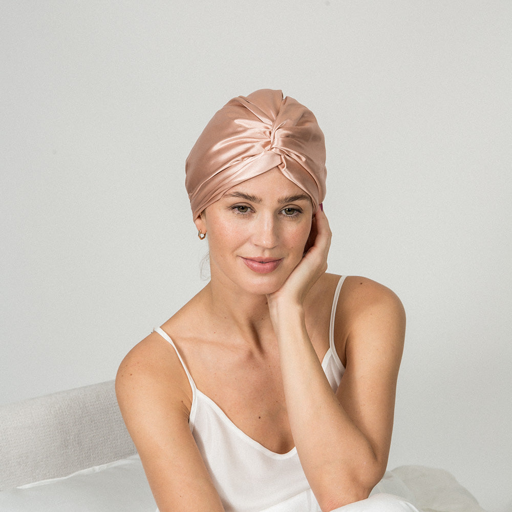 woman wearing a rose pink color bonnet