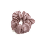 Pink scrunchie on a white background
