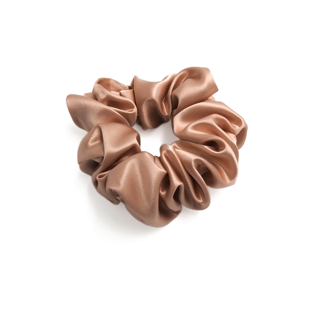 Rose pink scrunchie on a white background